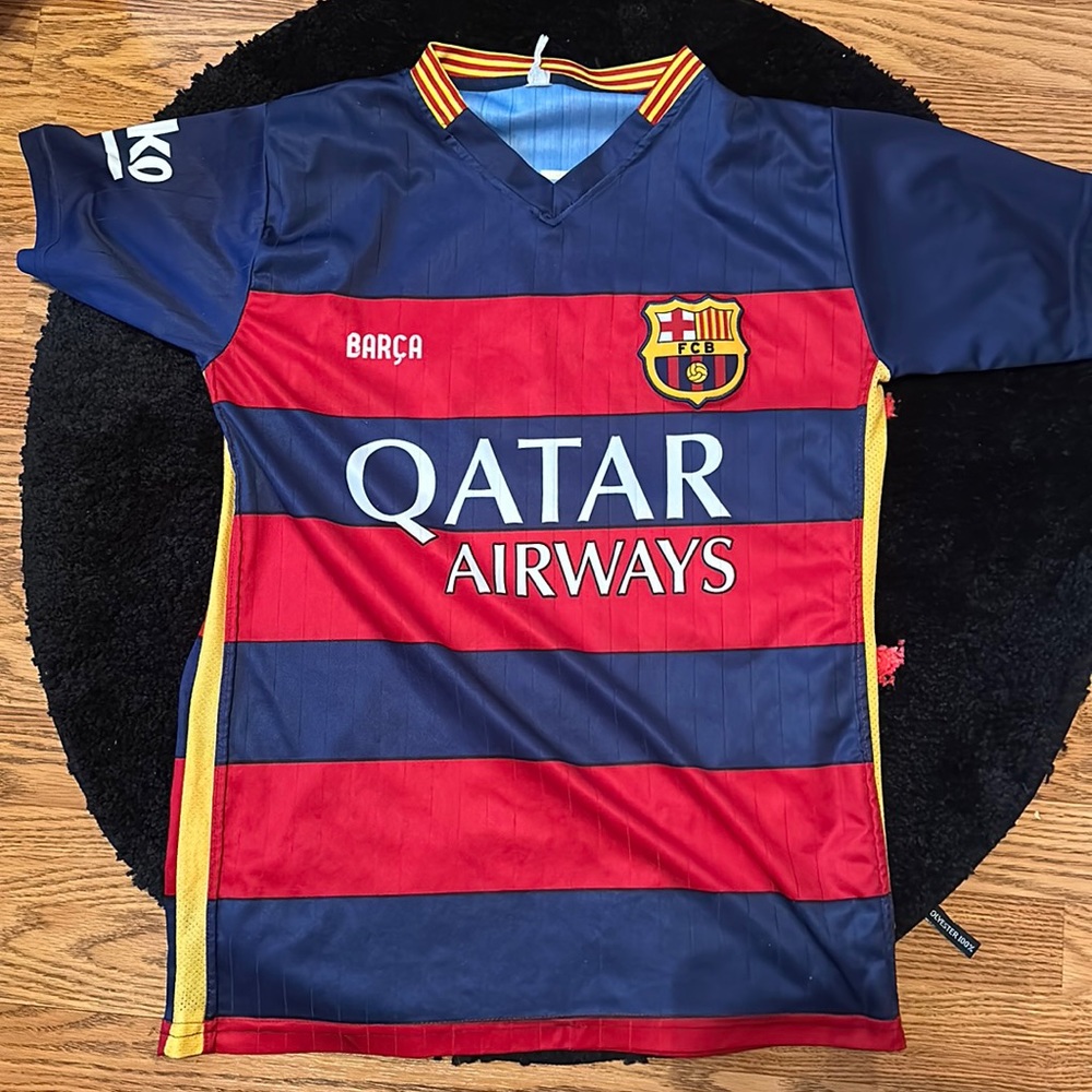 Used Messi Barcelona Soccer jersey size medium.Very clean